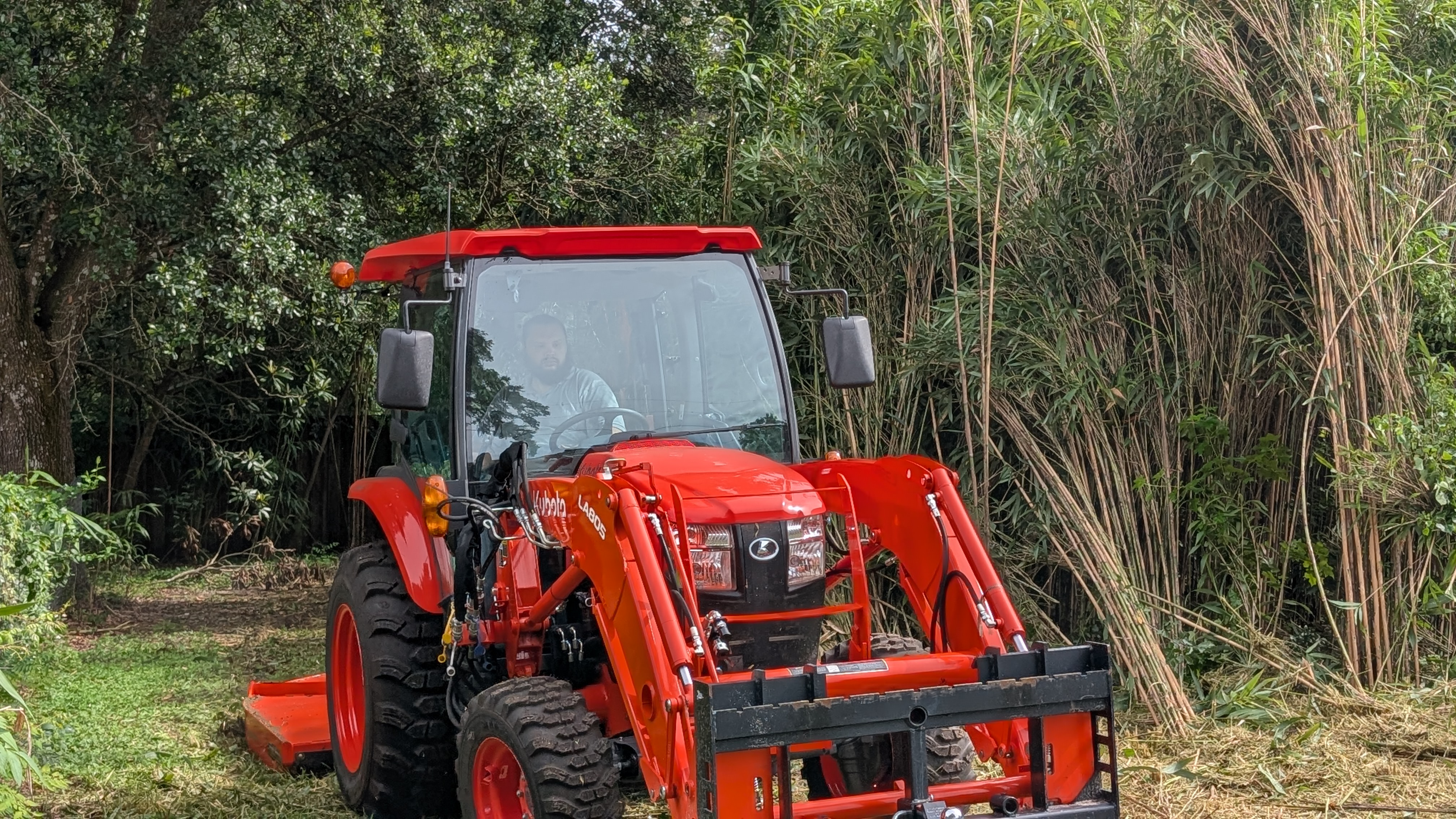 Tractor doing brush hogging